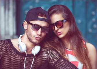 Sexy and fashionable couple in sunglasses. Vogue