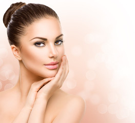 Wall Mural - beautiful young woman with clean fresh skin close up