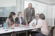 © Westend61 - Germany, Munich, Businesspeople in meeting
