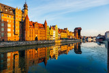 Fototapeta Niebo - The riverside with promenade of Gdansk, Poland.