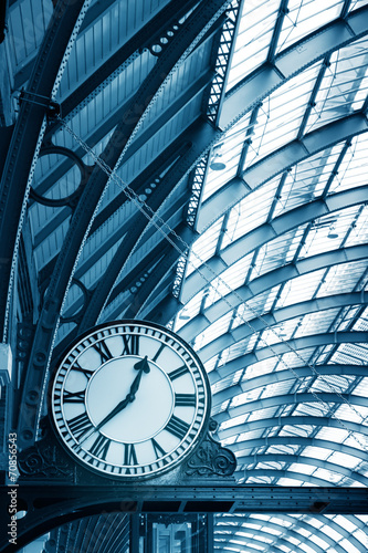 Fototapeta na wymiar art Clock on the modern building in the subway station