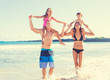 © EpicStockMedia - Family on the Beach