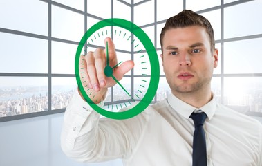 Poster - Composite image of young serious businessman pointing