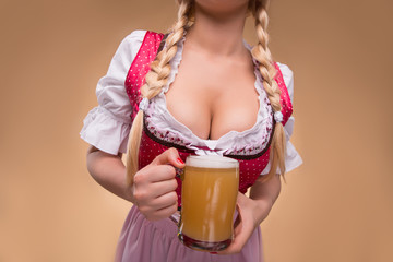 Young sexy blonde wearing dirndl