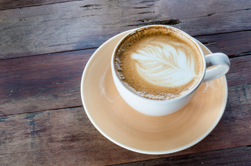 latte on a wood table