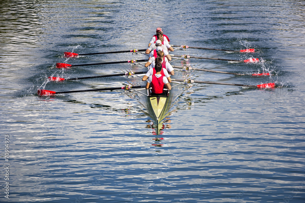 Eight men rowing Stock Photo | Adobe Stock