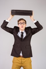 Poster - Young geeky businessman holding briefcase