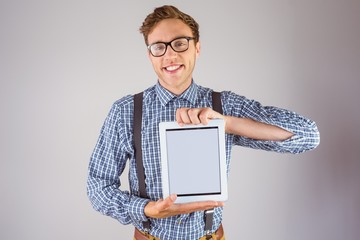 Poster - Geeky businessman showing his tablet pc