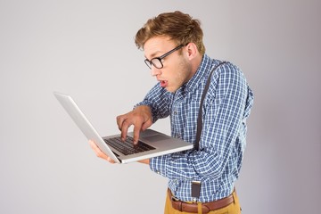 Poster - Geeky businessman using his laptop