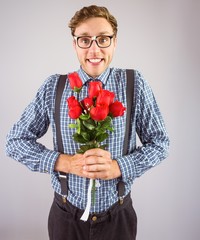 Poster - Geeky hipster holding a bunch of roses