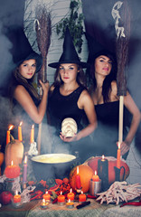 three witch with a skull.tinted