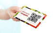 © Aleksandra Gigowska - hand holding food discount coupon with qr code isolated over whi