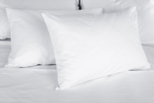 White Pillows On Bed Close Up