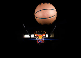 Poster - Basketball on  black background with light effect