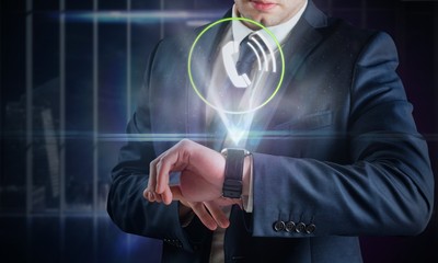 Poster - Composite image of businessman using hologram watch