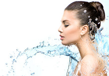 Beautiful Model Woman With Splashes Of Water In Her Hands