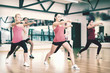 © Syda Productions - group of smiling people exercising in the gym