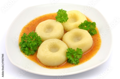 Fototapeta na wymiar dumplings with goulash sauce