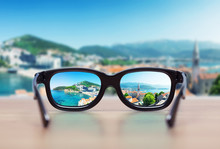 Cityscape Focused In Glasses Lenses