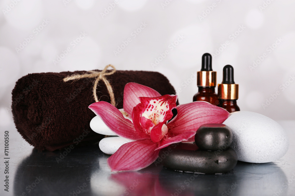 Spa composition with orchid and spa stones
