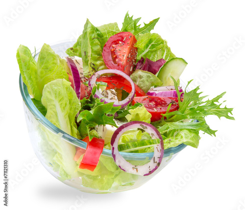 Fototapeta na wymiar Fresh tasty salad on white background