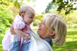 © mimagephotos - Happy grandmother with cute baby