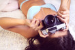 © ambrozinio - girl in lingerie takes pictures old camera