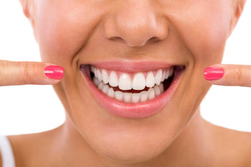 Wall Mural - Woman showing her perfect teeth