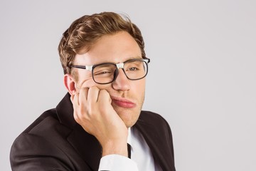 Poster - Young geeky businessman looking bored