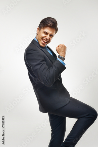 Fotografía Business Man Celebrating Success against White Background