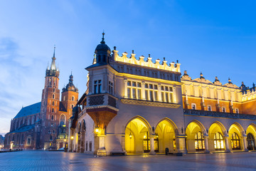 Wall Mural - Sukiennice and St. Mary's Church at night in Krakow, Poland.