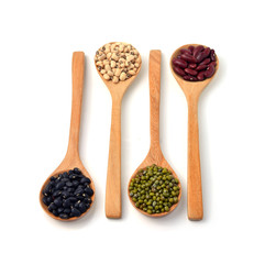 Poster - Green beans, black beans, red beans in wooden spoon, white backg