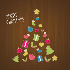 Sticker - Christmas tree from ornaments on wooden background