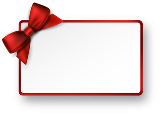 White paper gift card with red satin bow.