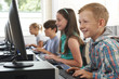 © highwaystarz - Group Of Elementary School Children In Computer Class