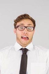 Poster - Geeky businessman looking at camera