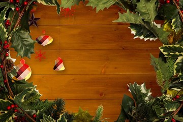 Poster - Composite image of holly and christmas branches forming frame