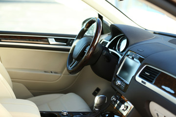 Wall Mural - Interior view of car with beige salon and black dashboard