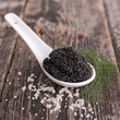 black caviar in spoon