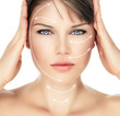 © Stasique - Laser therapy on pretty woman face, isolated over white