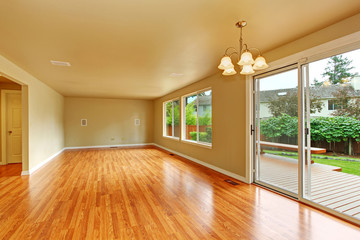 Wall Mural - Empty living room with exit to backayrd deck