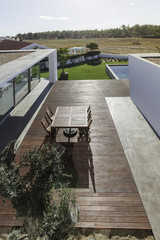 Wall Mural - Modern house with garden swimming pool and wooden deck