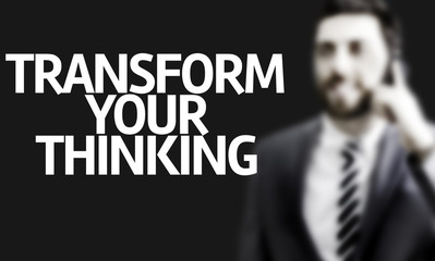 Business man with the text Transform your Thinking