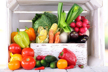 Wall Mural - Vegetables in wooden box on white wooden box background