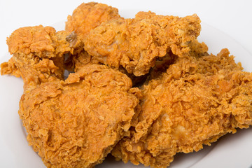 Wall Mural - Closeup of Fried Chicken on white Plate