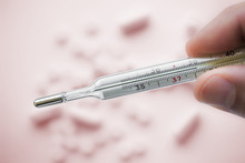 Mercury thermometer which showing 38C