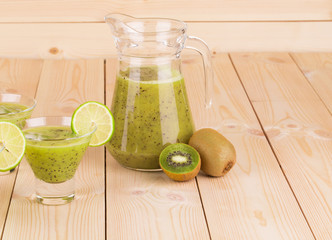 Sticker - Glass pitcher full of fresh kiwi smoothie.