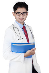 Canvas Print - General doctor holding a folder