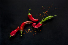 Chili Peppers On A Black Background