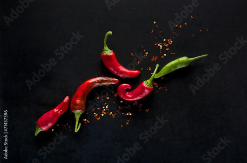 Fotografia  Chili peppers on a black background